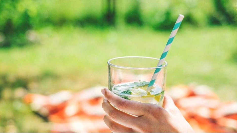 [a person holding water]